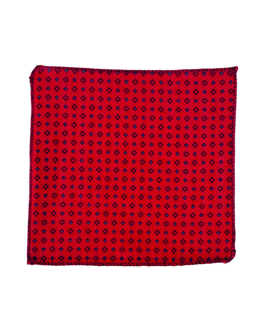 Red pocket square with black geometric pattern on a white background