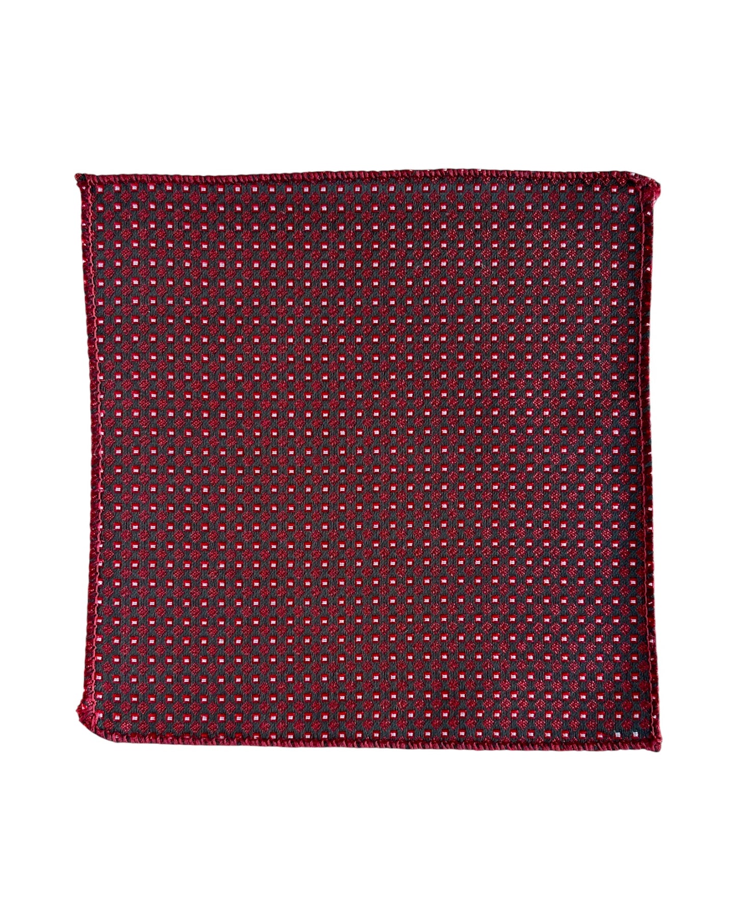 Red pocket square with a subtle pattern on a white background