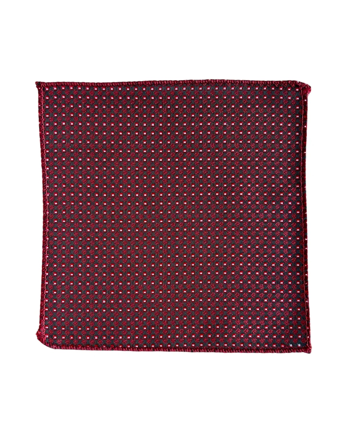Red pocket square with a subtle pattern on a white background