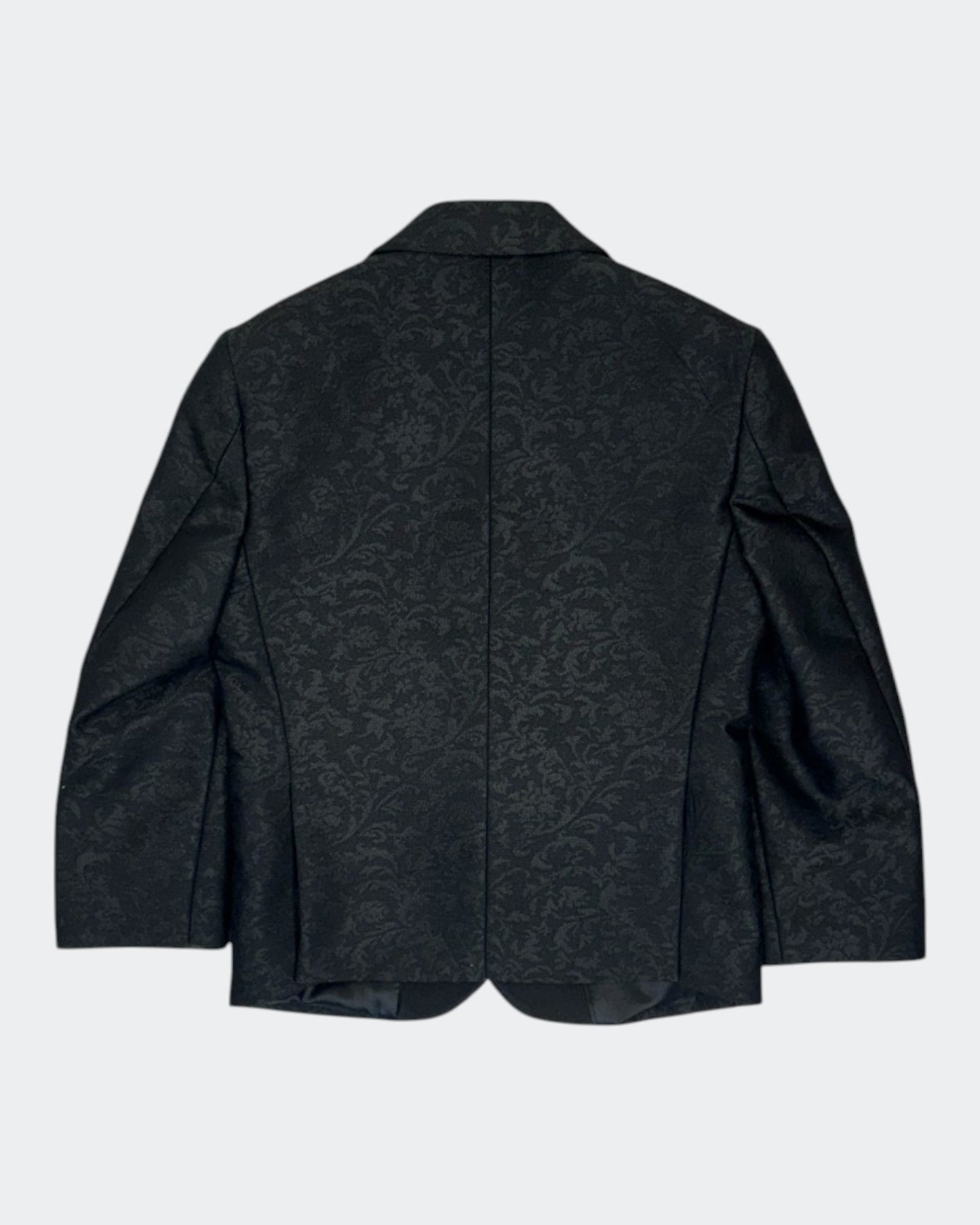 flat lay of back of black kids jacquard blazer
