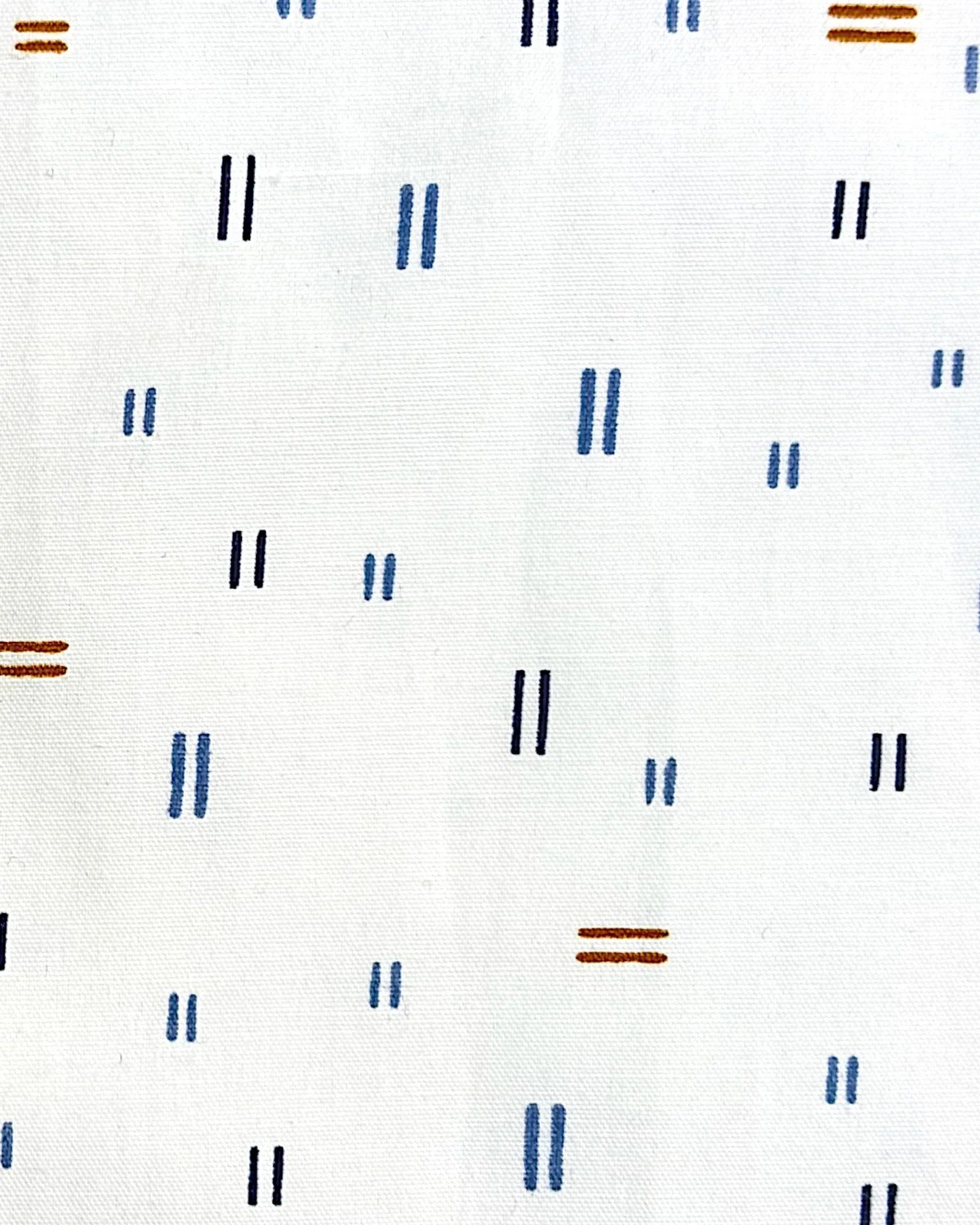 Extreme close up of shot sleeves shirt, featuring an abstract pattern on a white shirt.
