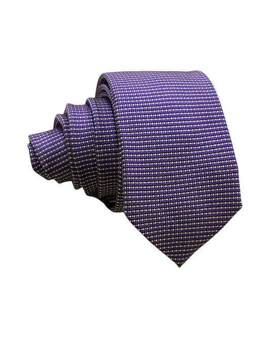 Purple polka dot tie on a white background