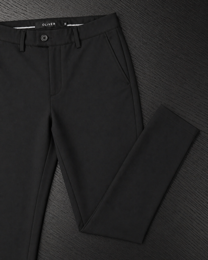 Boys black stretch dress pants front angled view slim fit formal trousers