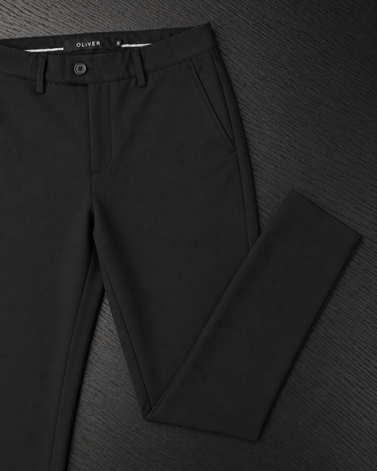 Boys black stretch dress pants front angled view slim fit formal trousers