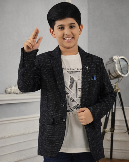 Kids black party blazer with textured finish styled with t-shirt, ideal for boys birthday outfits and events