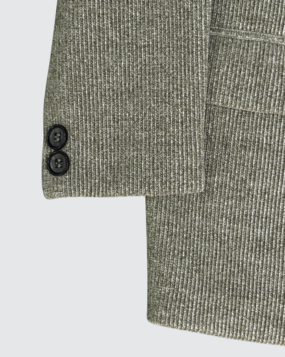 Detail of boys olive corduroy blazer sleeve showing button cuffs and textured corduroy fabric finish