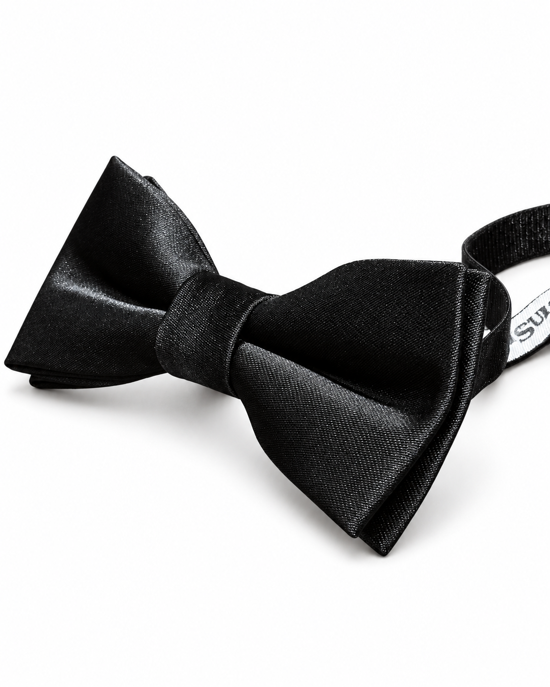 A pre-tied boys black microfibre bow tie with a matching black elastic band, displayed on a clean white background.