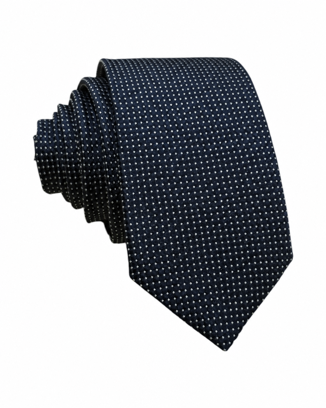 A rolled-up necktie featuring a small white micro-dot pattern on a dark navy blue background, isolated on a white studio background.