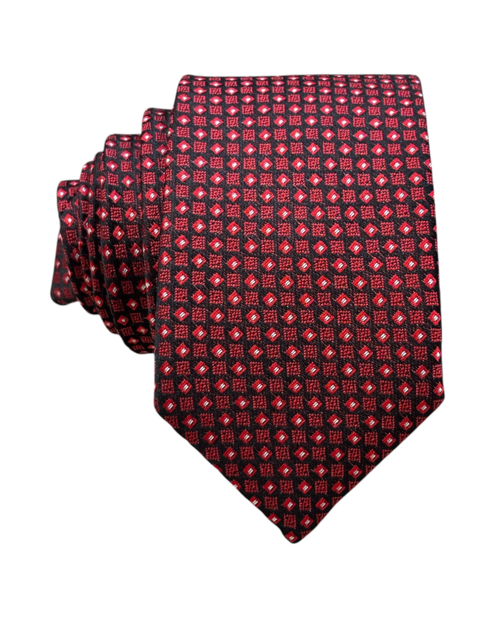 Red patterned tie on a white background