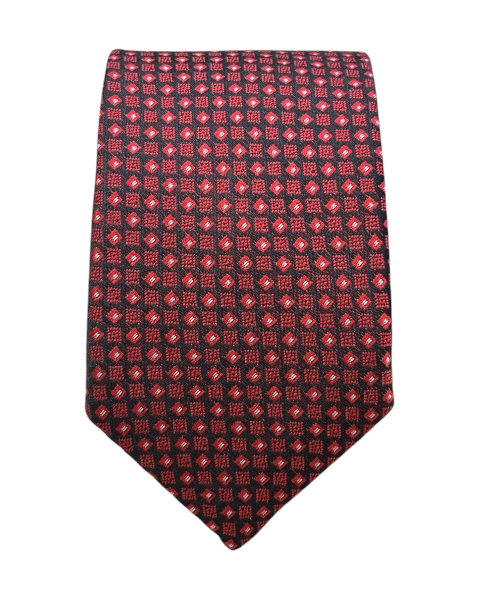 Red patterned tie on a white background