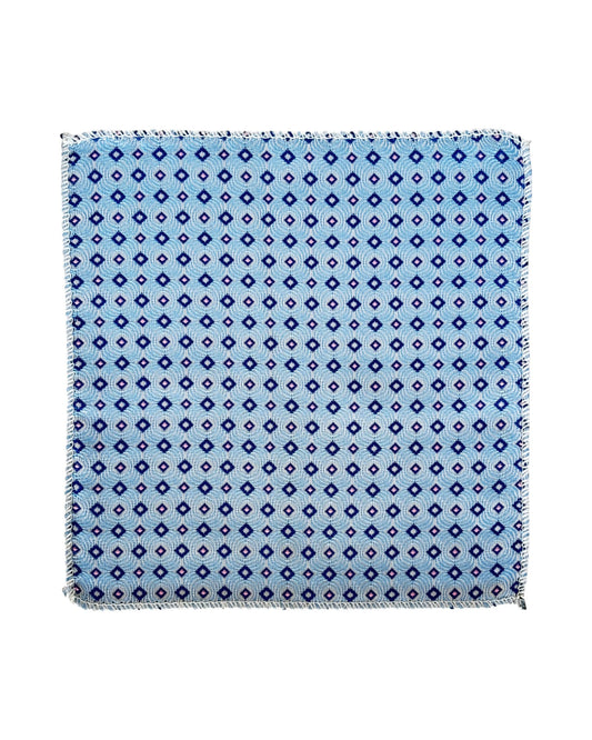 Blue patterned pocket square on a white background