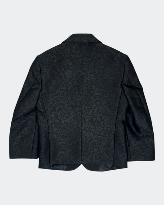 flat lay of back of black kids jacquard blazer