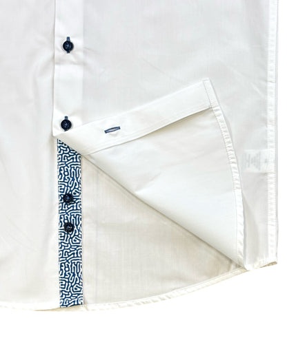 Close-up of a white short sleeves shirt close up on the lower buttons.