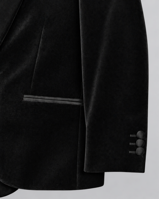 close up of a black kids velvet blazer