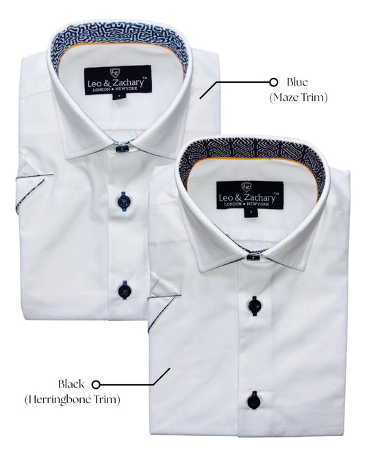 Two white boys dress shirts with different trim options on a white background.