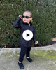 young boy wearing black shirt and black chinos running in  4 different areas